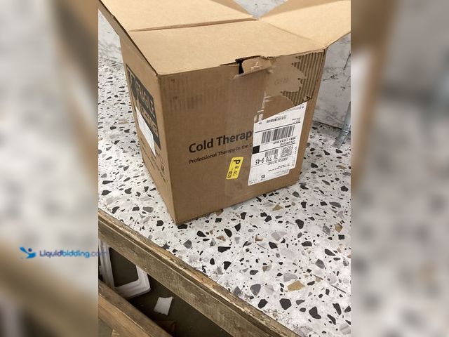 Lot 49-5460628 - General Armor Cold Therapy Machine Item is used.