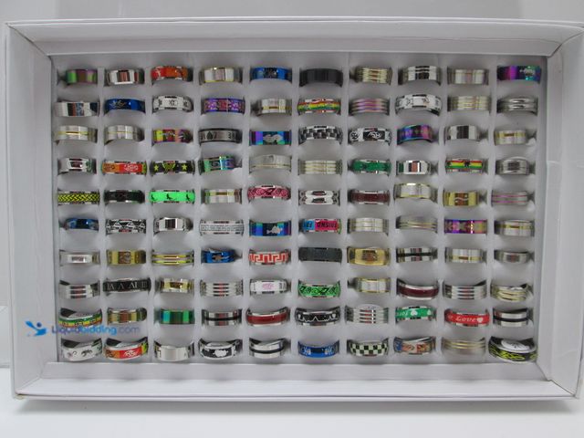 Lot 49-3435101 - Bulk Lot of 100 Stainless Steel Rings in Retail Display Box - NEW - Includes Men's and Women's Sizes...