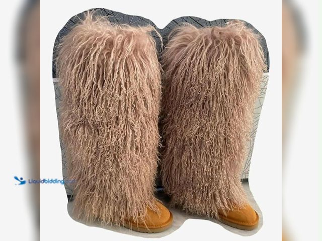 Lot 49-1990879 - REAL FUR BOOTS    YouLander Fur Boots MSRP $345.00. Above the knee Mongolian fur boots, size 8-9 wom...