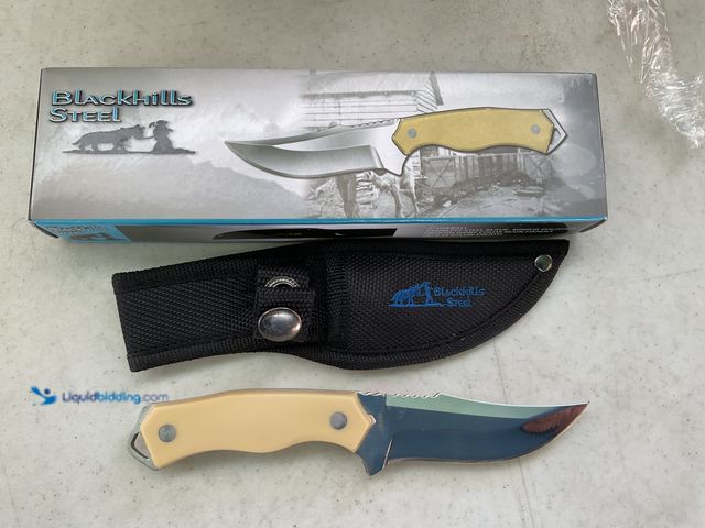 Lot 49-1505020 - COLLECTIBLE NEW BLACK HILLS STEEL 7 INCH OVERALL STAINLESS STEEL BLADE IVORY HANDLE NYLON SHEATH IN ...