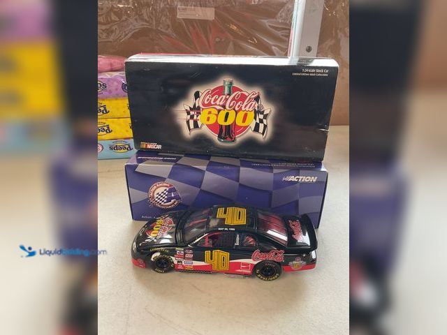 Lot 49-5341595 - ACTION RACING #40 COCA-COLA 600 CHARLOTTE MOTOR SPEEDWAY 1/24 SCALE DIECAST CAR IN ORIGINAL BOX