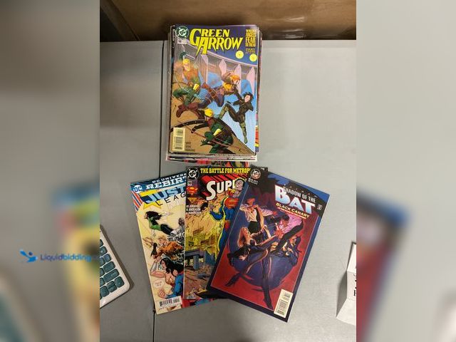 Lot 49-1830570 - COLLECTIBLE LOT OF 20 COLLECTIBLE COMIC BOOKS FROM DC, MARVEL AND MORE. INCLUDING JUSTICE LEUGUE, SU...