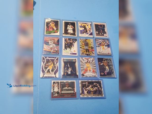 Lot 49-1817774 - 14- COLLECTIBLE LEBRON JAMES NBA BASKETBALL CARDS. VARIOUS BRANDS AND YEARS PRODUCED. INCLUDES MANY ...