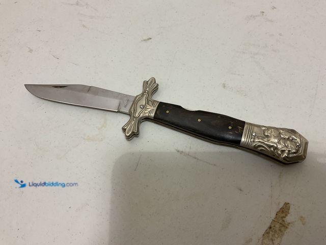 Lot 49-1835324 - Other VERY NICE VINTAGE STAINLESS STEEL KNIFE LOOKS LIKE A SWORD/DAGGER BUT FLIPS CLOSED #COINS0723