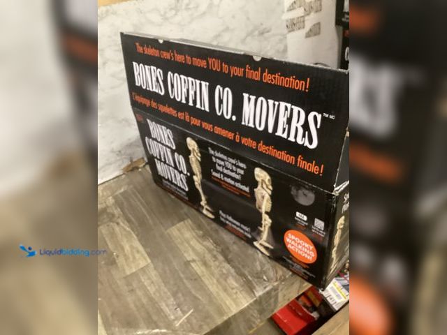 Lot 49-5436803 - Animatronics Bones Coffin Co Movers sound & motion activated walks & plays music. Slightly used.