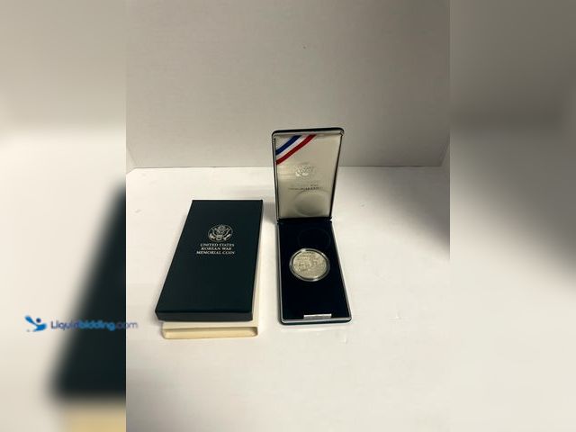 Lot 49-910552 - United States Korean War Memorial Silver Dollar – Original U.S. Mint Box & Display Case This United ...