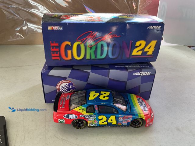Lot 49-1810344 - COLLECTIBLE ACTION RACING #24 JEFF GORDON DUPONT 1/24 SCALE DIECAST CAR IN ORIGINAL BOX