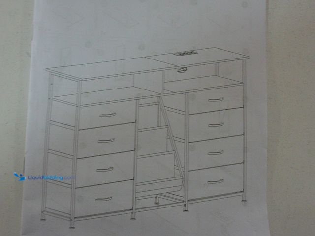 Lot 49-1557137 - 8 Drawer Fabric Dresser with Metal Frame, Engineered Wood Top and Power Outlet, Black, Model # 55SCF...