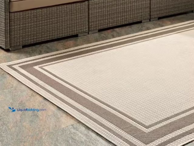 Lot 49-2026020 - MODWAY Rim Solid Border Borderline 8 ft. x 10 ft. Indoor and Outdoor Area Rug in Light and Dark Beig...
