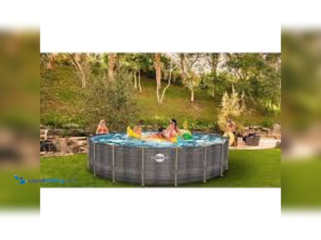 Lot 49-5415557 - Sunneday 18 ft. Round x 52 in. D Rattan Soft-sided Oasis Pool. Model # 70018. New/factory sealed.