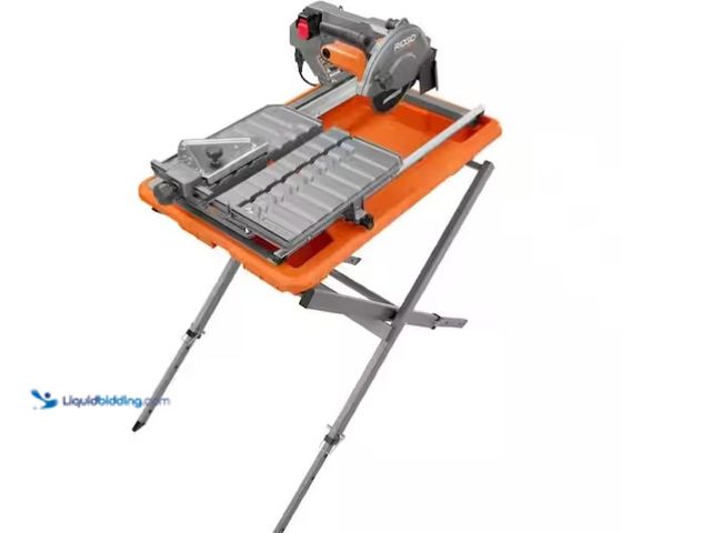 Lot 49-1575732 - RIDGID 9-Amp 7 in. Blade Corded Wet Tile Saw with Stand, Model # R4031S, Used, Unable to test, Scuff...