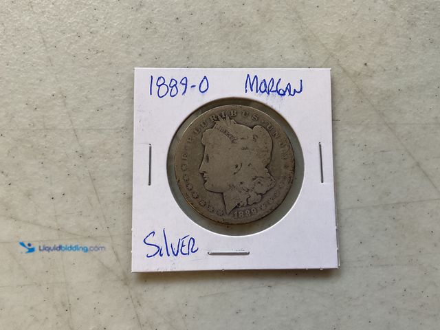 Lot 49-1505231 - 1889-O MORGAN SILVER DOLLAR COIN #COINS1211