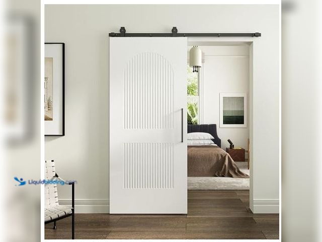 Lot 49-1632040 - BarnSmith 36''x84'' Sliding Barn Door, 2 Panel with Reeded Arc White Primed Sliding Closet Door with...