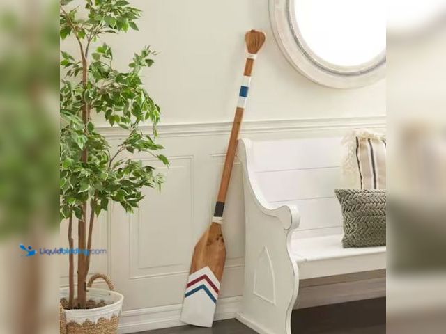 Lot 49-1623465 - Litton Lane 7 in. x 58 in. Wood White Novelty Canoe Oar Paddle Wall Decor with Arrow and Stripe Patt...