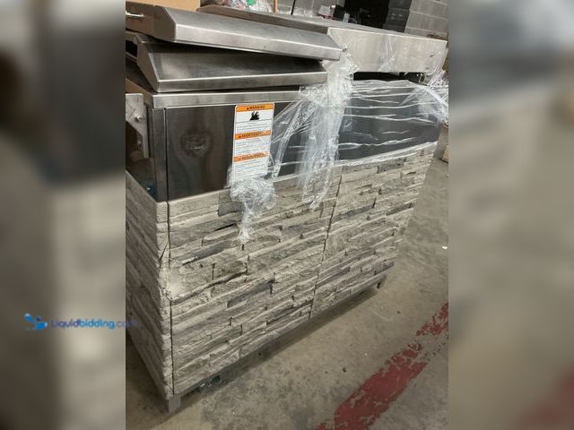 Lot 49-5484698 - Kirkland Signature Stone Island 12-Burner Gas Grill (only one part of grill) (dents) (scuffs and scr...