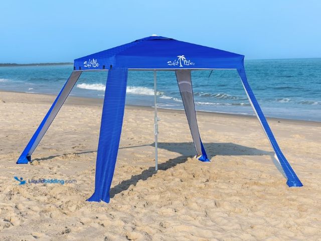 Lot 49-3615785 - Salt Life Beach Canopy 7'x7' in Blue with Carry Bag, Model # 20081968694, Slightly used, Has attachm...