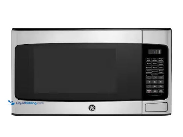 Lot 49-3432582 - GE 1.1 Cu. Ft. Capacity Countertop Microwave Oven, Model # GCST11N1WSS, Slightly used, Powers on.   ...