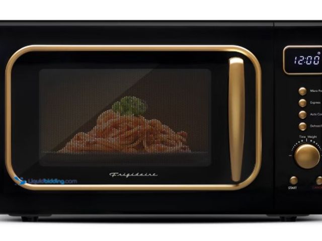 Lot 49-5542507 - Frigidaire 0.7 cu ft Retro Microwave, Unused with no glass pane, powers on