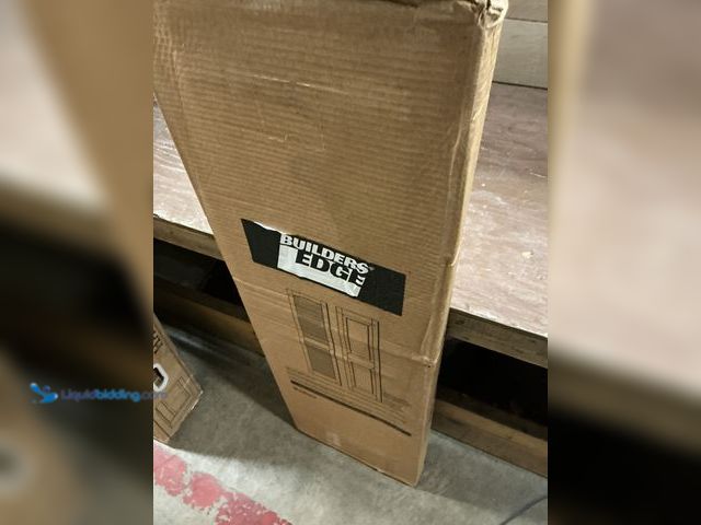 Lot 49-3540028 - Builders Edge Raised Panel Vinyl Shutter 15" x 51" - Black (box damage) (scuffs and scratches) Unuse...