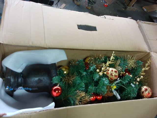 Lot 49-1547284 - 4.5ft Pre-Lit Royal Easton Potted Artificial Christmas Tree, Model# 1005351202, Slightly used, Scuff...