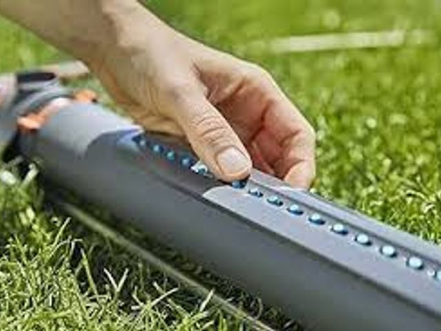 Lot 49-3539218 - GARDENA 3-Adjustment 3800 Sq. Ft. Aquazoom Oscillating Sprinkler for Even Flow. Model # 18714-81.000...