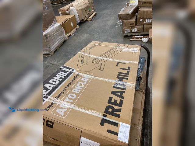 Lot 49-3532059 - Auto Incline Treadmill Item is used, powers on, remote broken piece on back