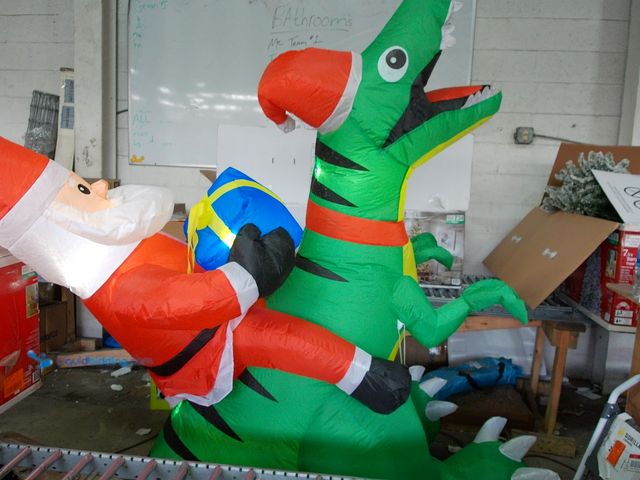 Lot 49-1546931 - Large Inflatable Airblown Santa with Dinosaur, Self-Inflating, Slightly used, Tested works.  Ref#HOL...