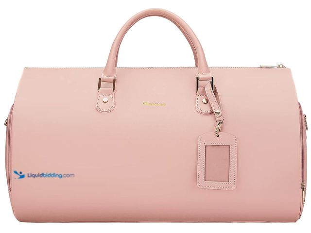 Lot 49-2026404 - Modoker 2-in-1 PU Leather Garment Duffle Bag with Shoulder Strap, Pink. Model #B0BQ5RM795. MSRP:$59....