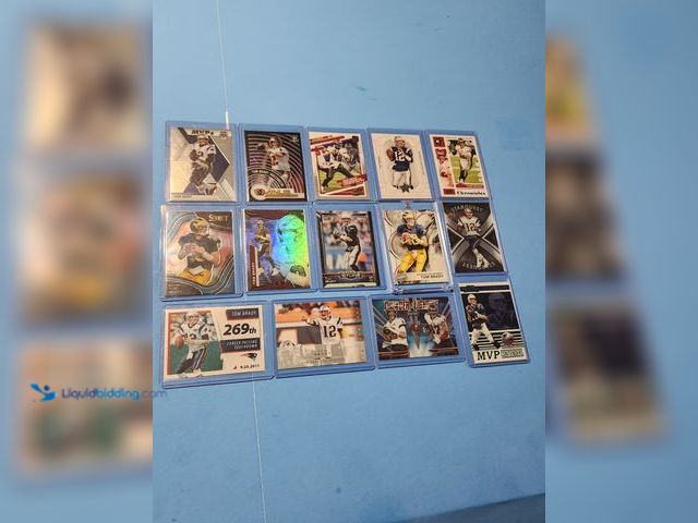 Lot 49-1817767 - 14- COLLECTIBLE TOM BRADY NFL FOOTBALL CARDS. VARIOUS BRANDS AND YEARS PRODUCED. "THE GOAT" NFL LEGE...