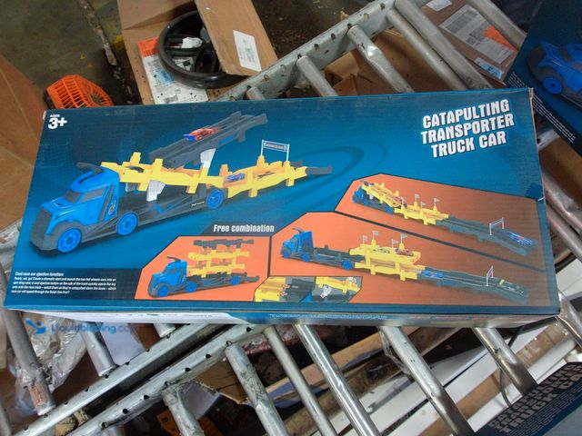 Lot 49-1549131 - (2x) Catapulting Transporter Truck Car Trailer Turns Into Circle Ramp, Model # 15-31, New, 2 Boxes/T...