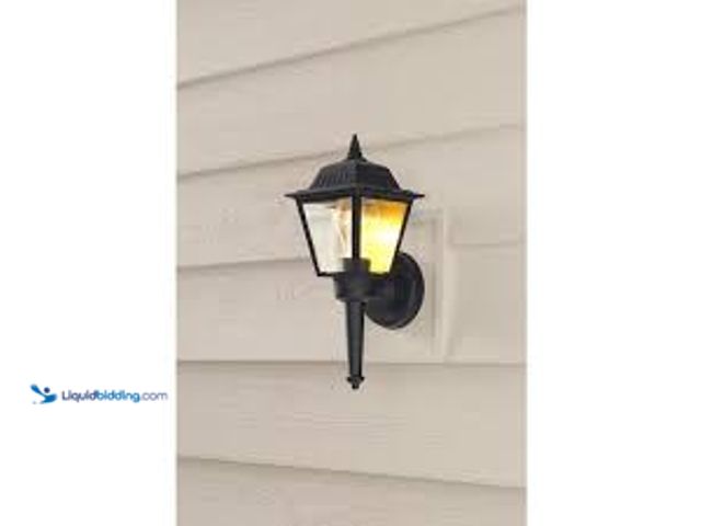 Lot 49-5415421 - 13.5 in. 1-Light Black Outdoor Wall Light Fixture Sconce with Clear Glass. Model # KB 5004. Used. Ha...
