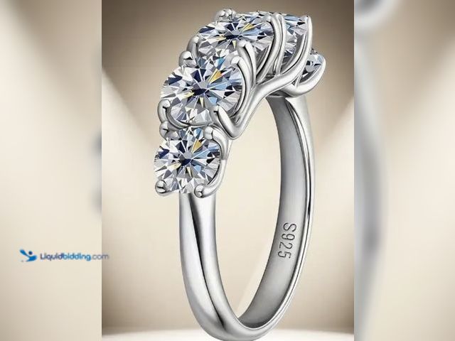 Lot 49-1831650 - Elegant 925 Silver Women's Ring, Full Row of Moissanite stones. Size 7. Brand new, unused.