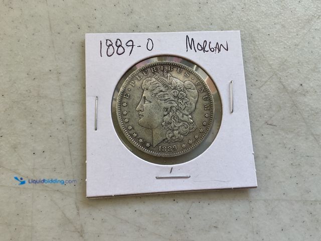 Lot 49-1505995 - 1889-O MORGAN ONE DOLLAR SILVER COIN #COINS1211