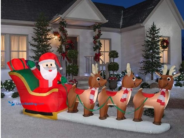 Lot 49-1540816 - HOME ACCENTS Holiday 12 ft. GIANT-SIZED LED Santa's Sleigh Scene, Indoor/Outdoor Airblown Inflatable...