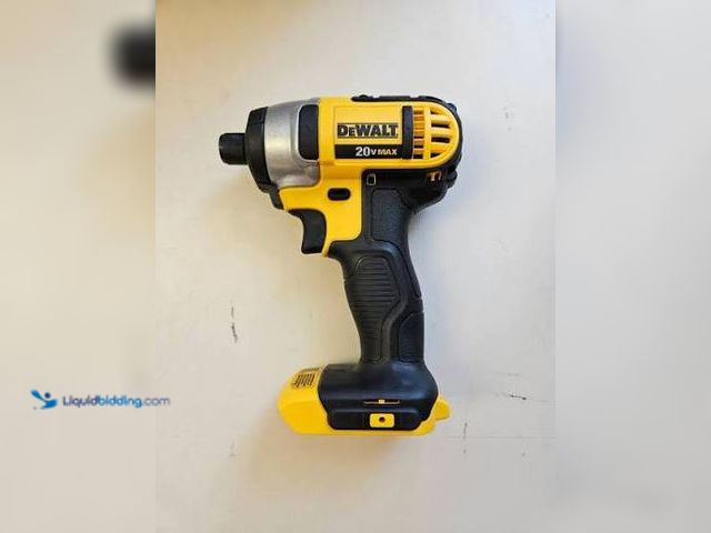 Lot 49-1971790 - 1 Dewalt DCF885 Battery Powered 20 Volt Drill And Grinder Dewalt 20 Volt 1/4" Impact Driver Used In ...