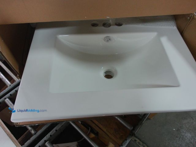 Lot 49-1555604 - 24" x 18 3/8" White Rectangular Bathroom Sink with three faucet holes, Unused.  Ref#BULK1126