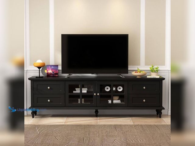 Lot 49-5416139 - FUFU&GAGA Modern Black Wood TV Console Media Console Entertainment Center with Glass Doors, 4-Drawer...