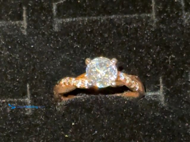Lot 49-1814688 - Sterling silver Moissanite  ring. Size is either 8 or 9. New never worn.