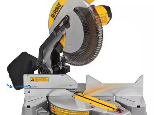 Lot 49-1565471 - DEWALT 15 Amp Corded 12 in. Single Bevel Compound Miter Saw, Model # DWS715, Unused, Tested works.  ...