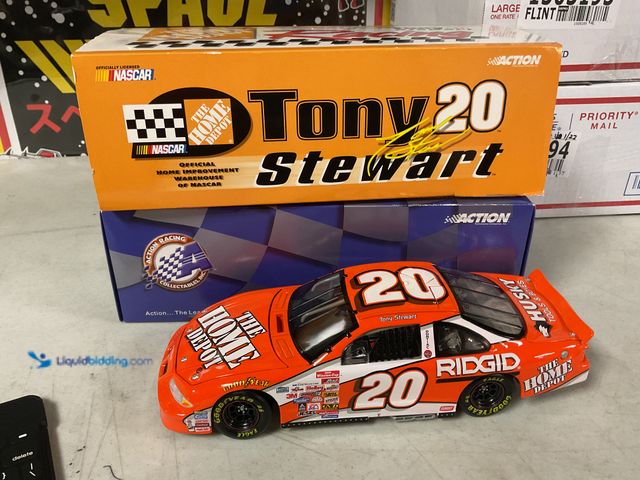 Lot 49-1505198 - COLLECTIBLE ACTION RACING #20 TONY STEWART THE HOME DEPOT 1/18 SCALE DIECAST CAR IN ORIGINAL BOX #CO...