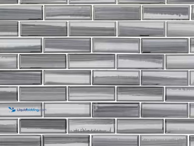 Lot 49-1623567 - APPROX. (9) SQ FT of MSI Ombre Grigia Subway 12 in. x 12 in. x 0.31 in. Glass Mesh-Mounted Mosaic Wa...