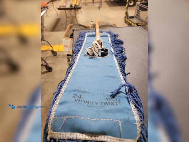 Lot 49-1816021 - 1 24" Floor Dust Mop 1 24" Floor Dust Mop with frame and 15-24" floor dust heads
Looped-end yarn tha...