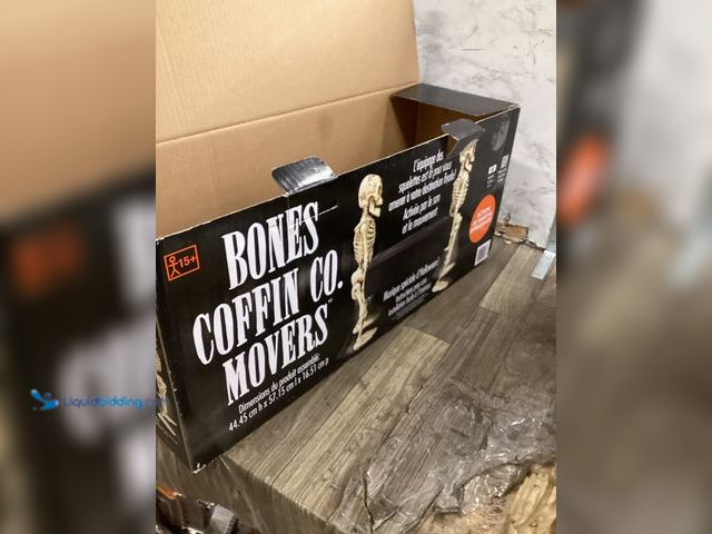 Lot 49-5436805 - Animatronics Bones Coffin Co Movers sound & motion activated walks & plays music. Unused.