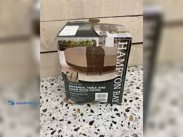 Lot 49-5485835 - HAMPTON BAY UNIVERSAL ROUND TABLE & CHAIR PATIO COVER 1002 667 510 BEIGE & BROWN. Unused.