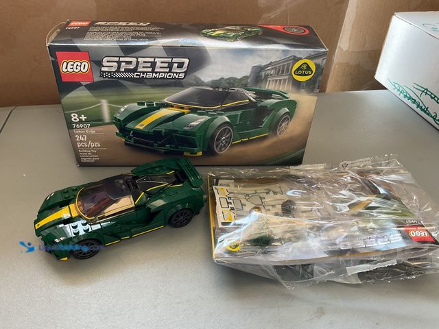 Lot 49-5341530 - PRE-OWNED COMPLETE IN ORIGINAL BOX LEGO SPEED CHAMPIONS LOTUS EVIJA 76907