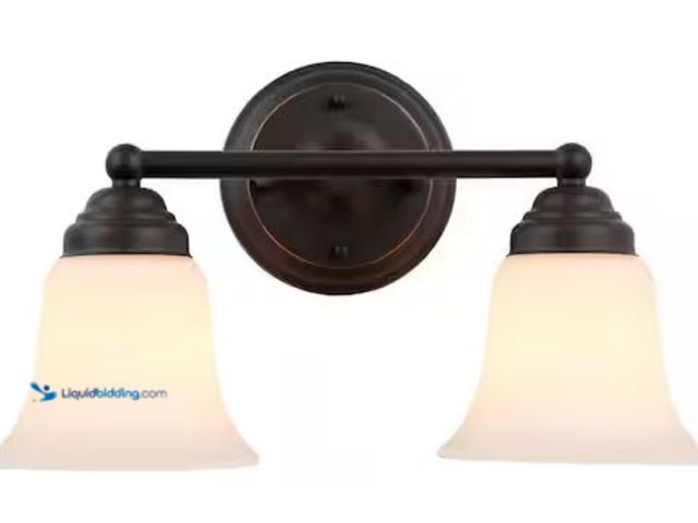 Lot 49-5478498 - Hampton Bay
Ashhurst 2-Light Oil Rubbed Bronze Vanity Light with Frosted Glass Shades Internet # 20...