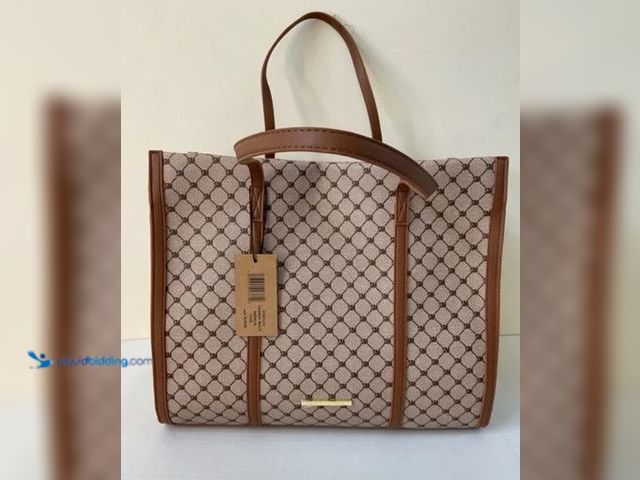 Lot 49-1512603 - Steve Madden Large Cognac Multi BBerlin Logo Monogram Bag in Bag, Model# 198190332985, Unused.  Ref#...