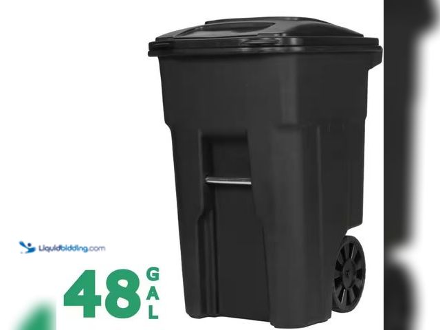 Lot 49-5538717 - Toter 48-gallon black garbage can featuring rugged wheels and an attached lid Unused