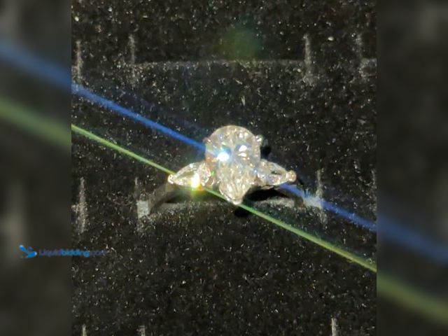 Lot 49-1814689 - Sterling silver Moissanite ring either size 8 or 9. New unworn.