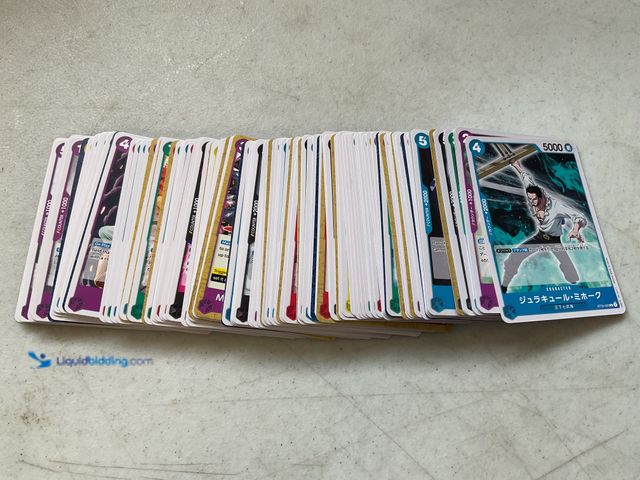 Lot 49-1830512 - COLLECTIBLE AWESOME STACK OF 100+ ONE PIECE COLLECTIBLE TRADING CARDS VARIOUS YEARS AND TYPES LOADED...
